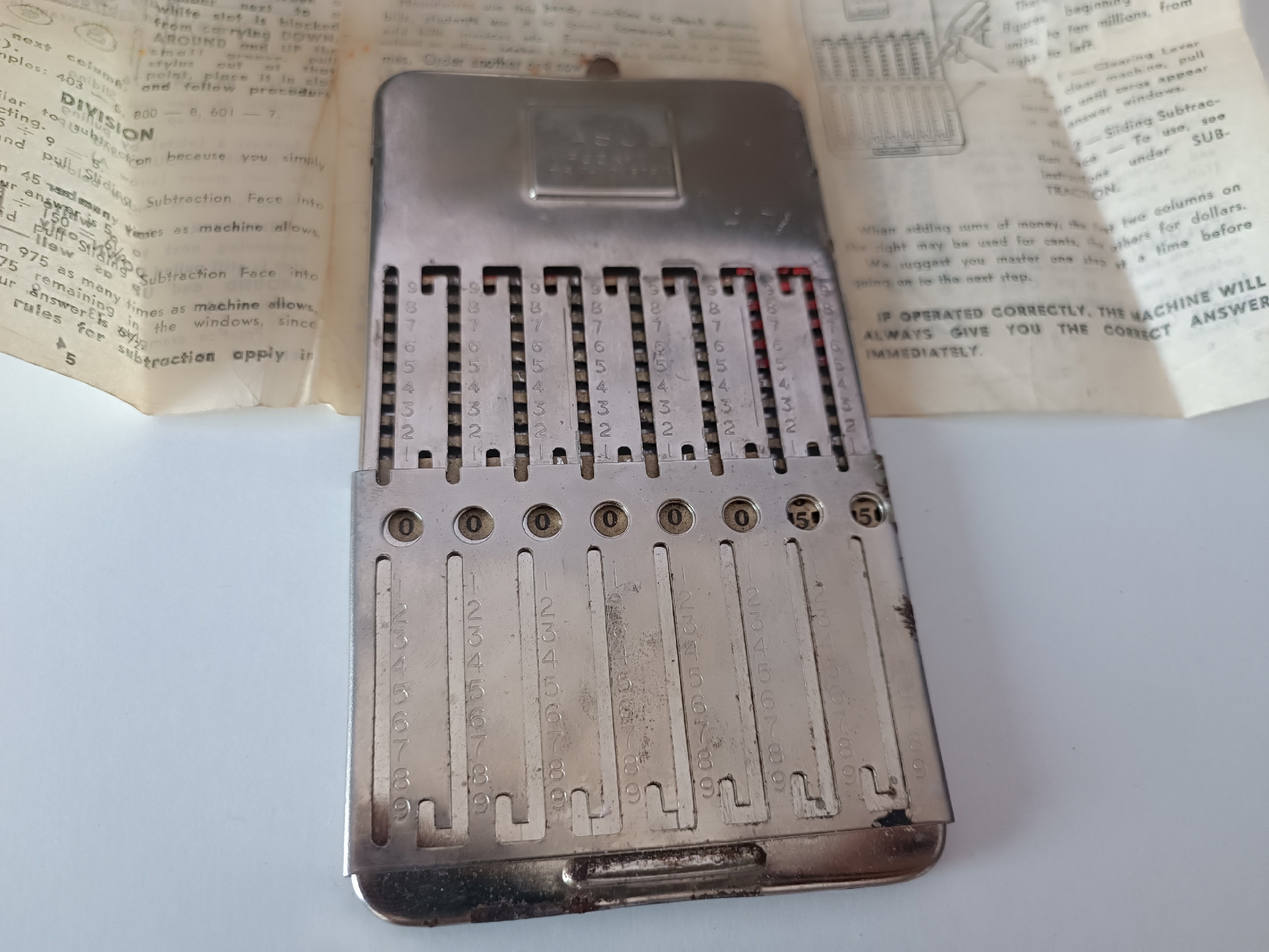 Tasco Pocket Arithmometer (карманный арифмометр)